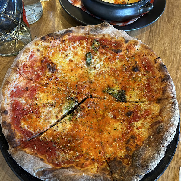 Margherita Pizza (sugo, fior di latte & basil) on coeliac-friendly base