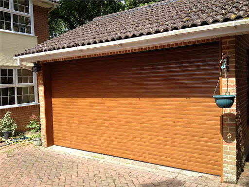 Up  Over To Electric Insulated Light Oak Roller Door