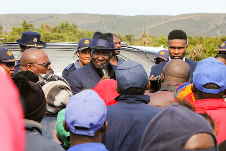 Police Minister Bheki Cele address crowds during his visit