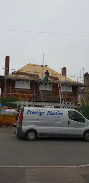 Prestige Plastics & Roofing  Logo