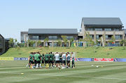 Bafana Bafana players in a discussion with the technical team during their training session at Steyn City School in Fourways, north of Johannesburg, on October 9 2018.