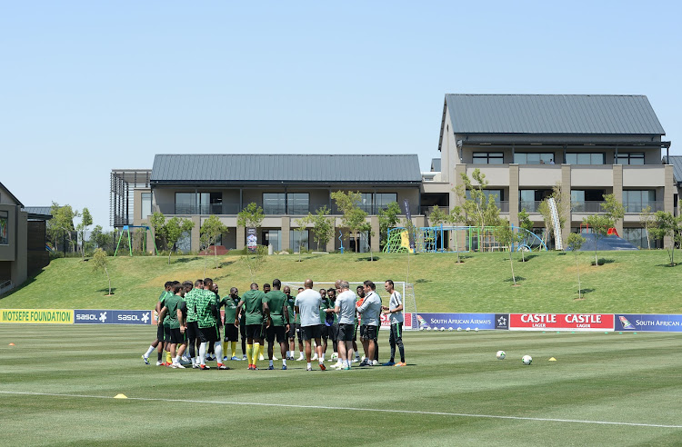 Bafana Bafana players in a discussion with the technical team during their training session at Steyn City School in Fourways, north of Johannesburg, on October 9 2018.