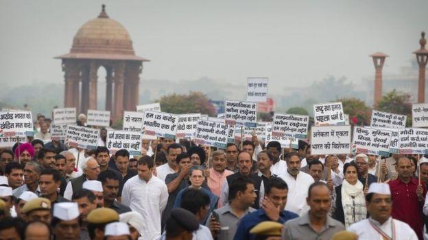 India’s opposition Congress party president Sonia Gandhi, centre in blue leads a march to the Presidential palace in Delhi, India, Tuesday, Nov. 3, 2015.