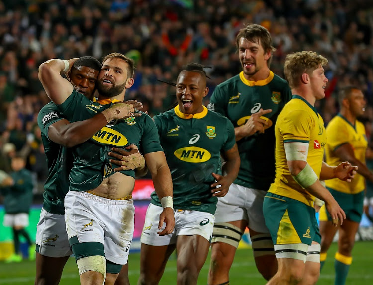 Springboks congratulate Cobus Reinach of South Africa after scoring his try during the The Rugby Championship match between South Africa and Australia at Emirates Airline Park on July 20, 2019 in Johannesburg, South Africa.