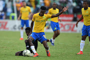 Themba Zwane of Mamelodi Sundowns in action with Neo Maema of Bloemfontein Celtics during the Absa Premiership match between Mamelodi Sundowns and Bloemfontein Celtic at Loftus Versfeld on March 02, 2019 in Pretoria, South Africa. 