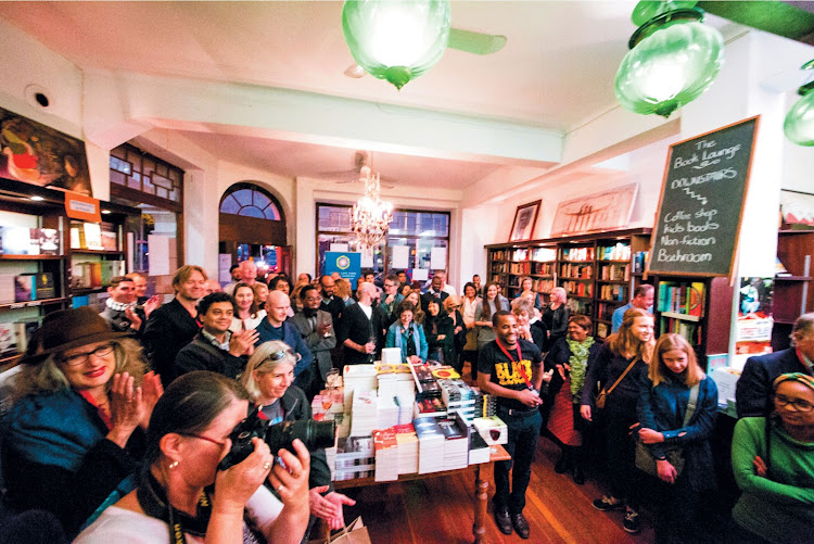 A full audience enjoys an Open Book Festival event at The Book Lounge