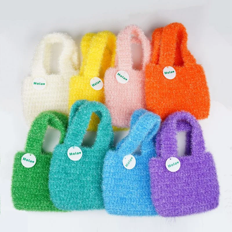 Retro-gebreide handtas voor dames. Een stijlvolle en praktische tas voor dagelijks gebruik, perfect om je essentials in mee te nemen met een vintage look.