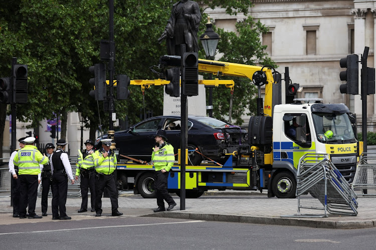 A police vehicle removes a car following a security incident near Trafalgar Square, as Queen Elizabeth's Platinum Jubilee celebrations continue, in London, Britain, on June 4, 2022.