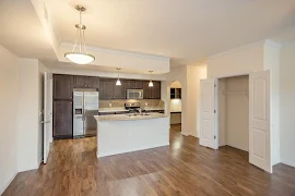 Open concept living areas with a coat closet