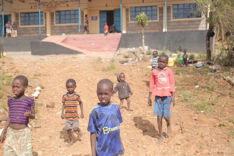 Hungry, worried school-going children camping at Sinoni, Baringo South on Monday.