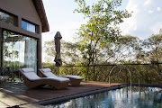 Relax on the deck of Moledi Gorge's presidential suite. 