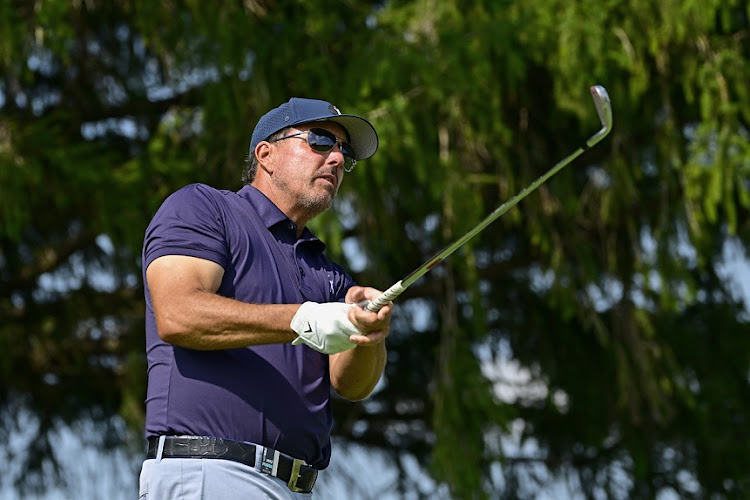 Team Captain Phil Mickelson of Hy Flyers GC plays his shot on the third tee on day one of the LIV Golf Invitational - Chicago at Rich Harvest Farms in Sugar Grove, Illinois on September 16 2022.