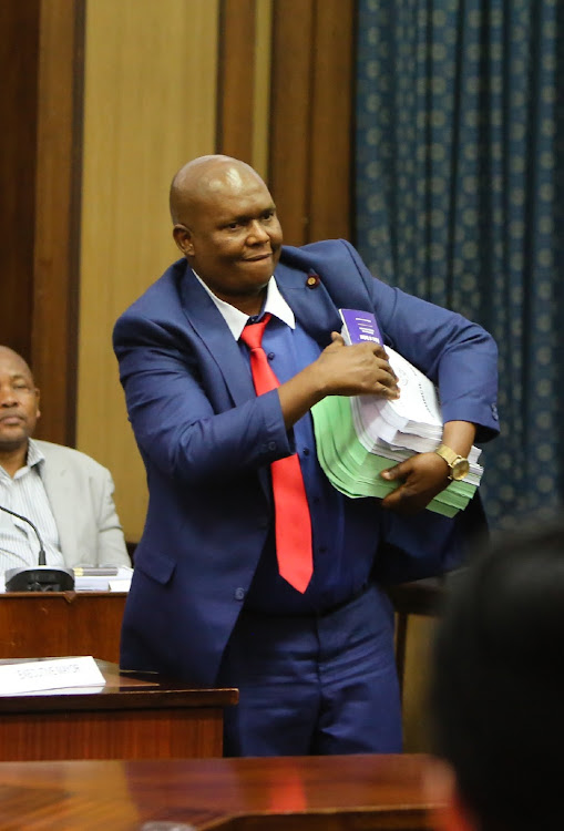 PACKING UP: Former Nelson Mandela Bay mayor Mongameli Bobani leaves the council chamber after he was removed through a motion of no confidence on Thursday last week