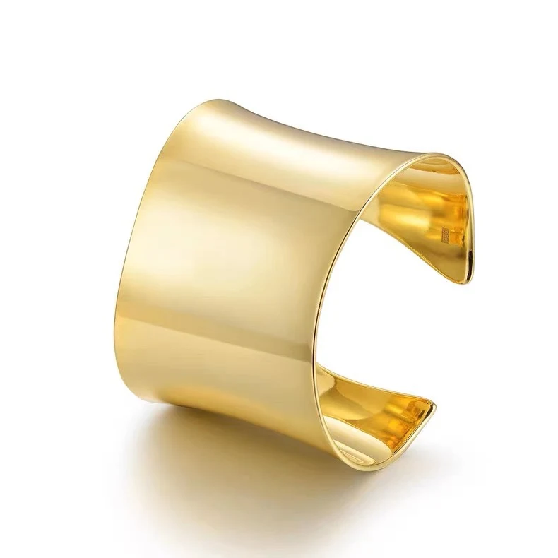 Elegante Pulsera Curvada Ancha Brillante Niche para un Look Sofisticado Diseño Moderno y Acabado de Alto Brillo Perfecta para Cualquier Ocasión.