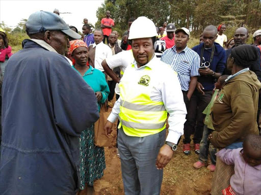 Limuru MP Peter Mwathi when he was inspecting the road