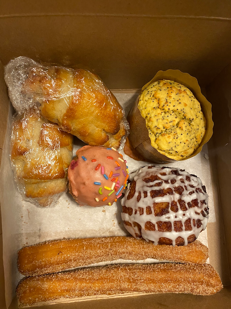 Churros, apple fritter, lemon poppyseed muffin, donut hole, two croissants!