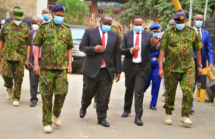 Deputy Inspector General of Police Edward Mbugua, Interior CS Fred Matiang'i, PS Karanja Kibicho and Police IG Hillary Mutyambai at Parliament Buildings on Wednesday, September 1, 2021