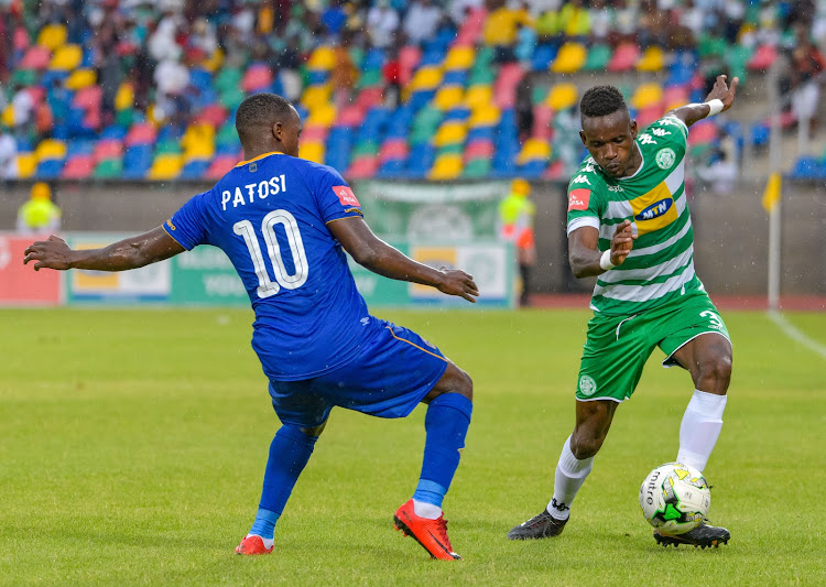 Ronald Pfumbizai of Bloemfontein Celtic and Ayanda Patosi of Cape Town City during the Absa Premiership match at Dr Molemela Stadium on 28 January 2018.