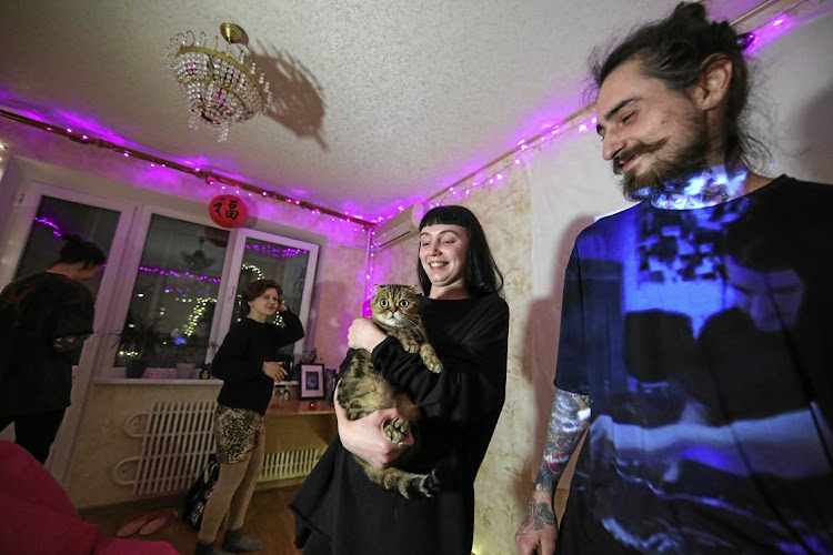 Three’s not a crowd, it’s a party. This trio, with their cat, were part of an online party streamed and organised by the Culture of Sound nightclub in Kharkiv, Ukraine. The country’s government this week imposed restrictions on public gatherings to prevent the spread of the coronavirus.