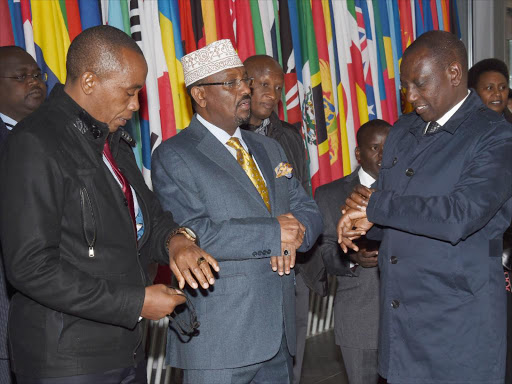 TICK-TOCK: Kiambu Senator Kimani Wamatangi, Fafi MP Bare Shill and Deputy President William Ruto at The Hague on Friday.