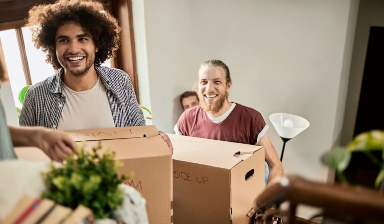 Friends helping with a move.