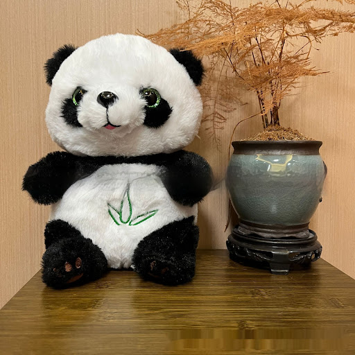 Title 2, Urocza pluszowa panda z muzyką, symulacją oddec...