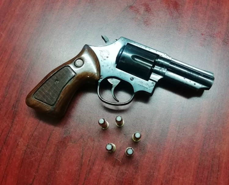 A .38 revolver with five rounds of ammunition was seized.