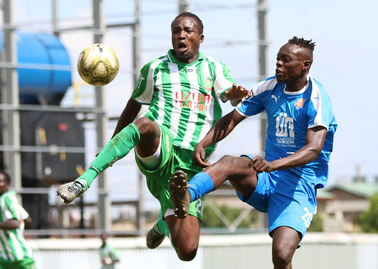 Nzoia's Randy Bakari (L) contests for the ball with Timothy Ouma of City Stars in a past match