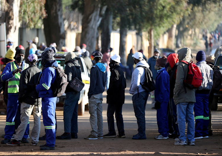 FILE PHOTO: Mining lost 7.8% of its jobs in the third quarter while manufacturing lost 3.2%.