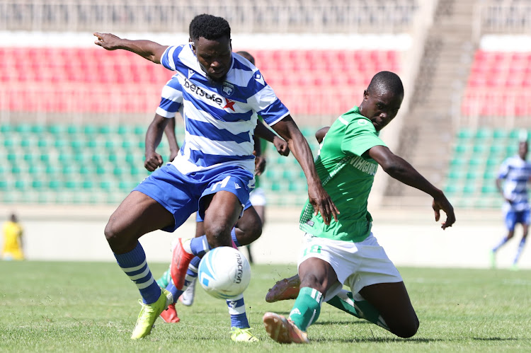 AFC Leopards forward Ojo Olaniyi (L) contests for the ball with Brian Ochieng of Vihiga Bullets during their Premier League match at Nyayo Stadium.