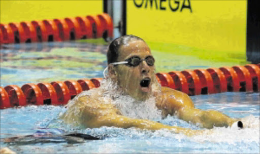 HELPING OUT : Team SA swimmer Roland Schoeman Photo: Anesh Debiky/Gallo Images