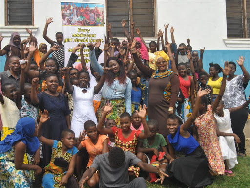 Mwanakombo said from beyond city limit organisation, Kilifi county Executive member for gender Maureen Mwangovya and Halima Ali Abba a reproductive health advocate working with DSW Kenya and volunteer member of Rising Winners Youth Empowerment initiative mission with young adolescents during the summit at Makia hall in Kanamae Kilifi South constituency on June 23./ALPHONCE GARI