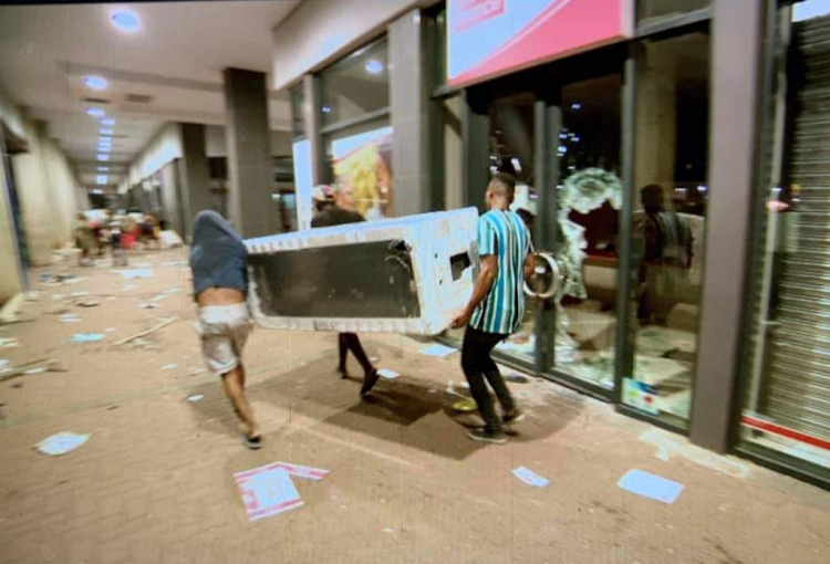 Looters caused extensive damage to the Umlazi Mega City mall, south of Durban, on Sunday night.