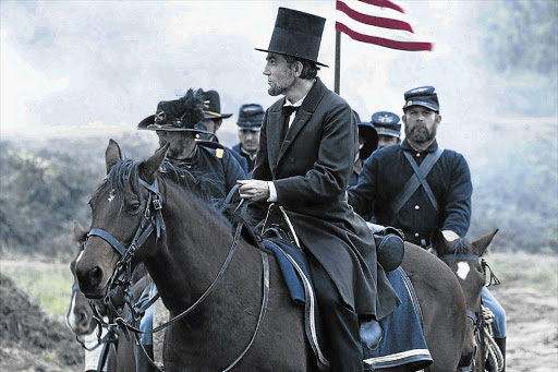 President Abraham Lincoln (Daniel Day-Lewis) looks across a battlefield in the aftermath of a terrible siege in this scene from director Steven Spielberg's drama "Lincoln" from DreamWorks Pictures and Twentieth Century Fox.
