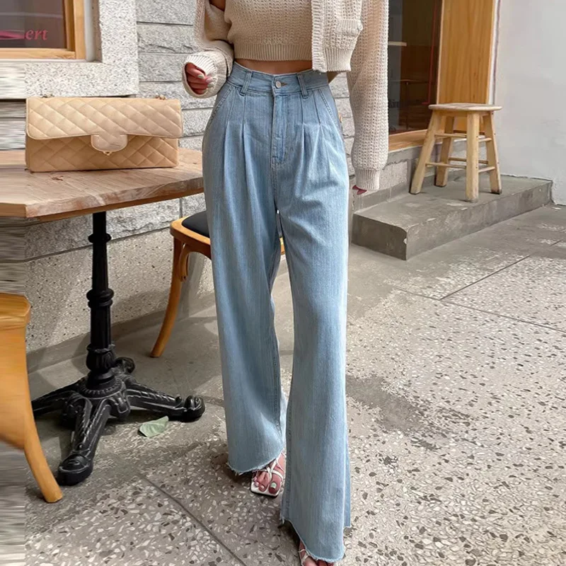 Jean large femme tendance, style personnalité, coupe palazzo, confortable et élégant pour un look décontracté ou habillé, idéal pour toutes les occasions.
