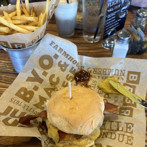 Kahuna burger (seasonal) with grilled pineapple and bacon. Very good. Amazing bun and fries!