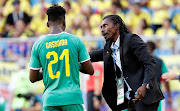 Senegal coach Aliou Cisse speaks wth Lamine Gassama during the World Cup match against Colombia at Samara Arena, Samara, Russia on June 28, 2018.