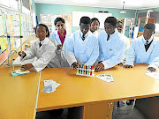 Pupils from Richard Varha High School in rural Dimbaza, Eastern Cape, do some experiments in the school's  science lab./SUPPLIED