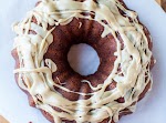 Spiced Apple and Banana Bundt Cake with Vanilla Caramel Glaze was pinched from <a href="http://www.loveveggiesandyoga.com/2012/09/spiced-apple-and-banana-bundt-cake-with-vanilla-caramel-glaze.html" target="_blank">www.loveveggiesandyoga.com.</a>