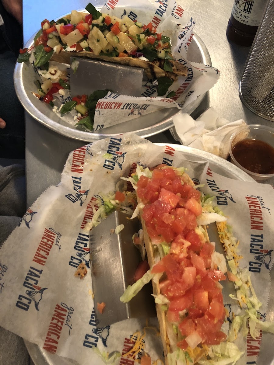 This is their regular size taco! They each weigh about a half pound! 
Top taco is the Baja Chicken and bottom is traditional Chicken. Both are on the hard corn shells and were amazing!