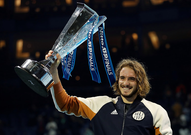 Greece's Stefanos Tsitsipas celebrates winning the ATP Finals in London on November 17 2019.