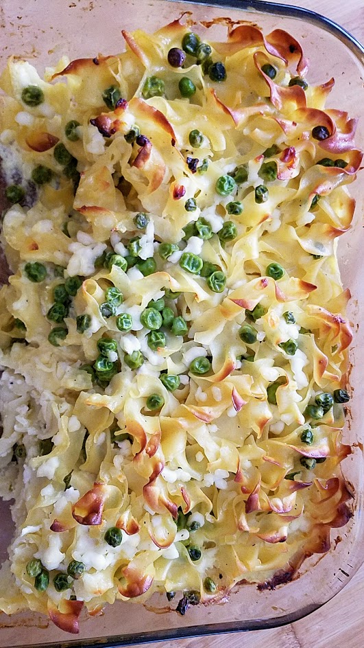 This Savory Cheese Kugel Recipe is my take on the Jewish casserole with egg noodles, butter, eggs, and cheese, with other optional add ins like here, peas and sauteed onions