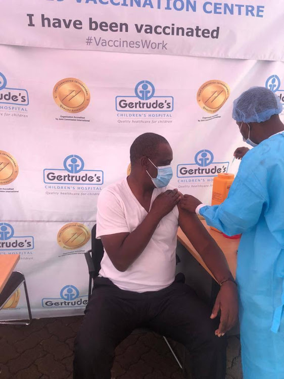 Evans Kidero getting his Covid-19 vaccine on March 29, 2021.