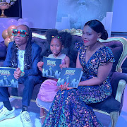 Robbie Malinga Junior on stage with his younger sister Zanokuhle and mother Ann at the launch of music icon and father Robbie Malinga's book. 