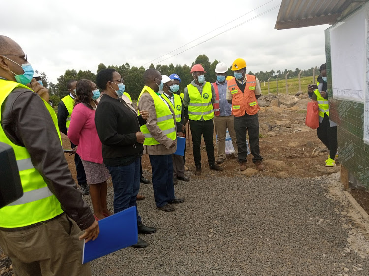 Water CS Sicily Kariuki and other officials inspect the Kerugoya-Kutus water sewer system Image: WANGECHI WANG'ONDU