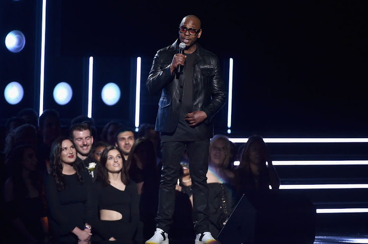 Comedian Dave Chappelle, pictured here at the 2018 GRAMMY Awards, has come under fire for homophobia and transphobia following the release of his trio of Netflix specials.