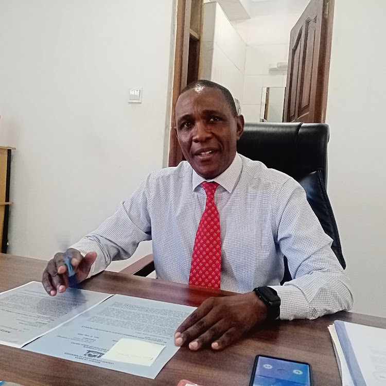 Kakamega county secretary Lawrence Omuhaka addressing the press in his office on Thursday