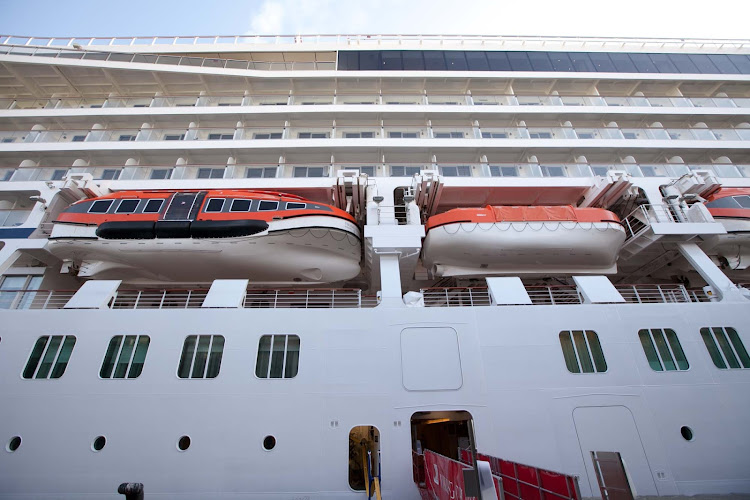 Tenders and lifeboats on the side of Viking Star. 