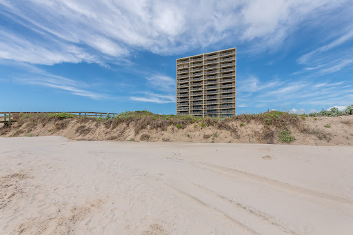 Modern building beach and sand dunes in this luxury apartment / penthouse for sale in Port Aransas ($450,000)