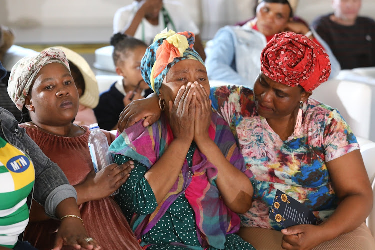 Monica Matsie and relative at the Mahube A Tumelo hall in Bloemfontein, where her son Katlego Bereng’s memorial service was held on Thursday May 4 2023.